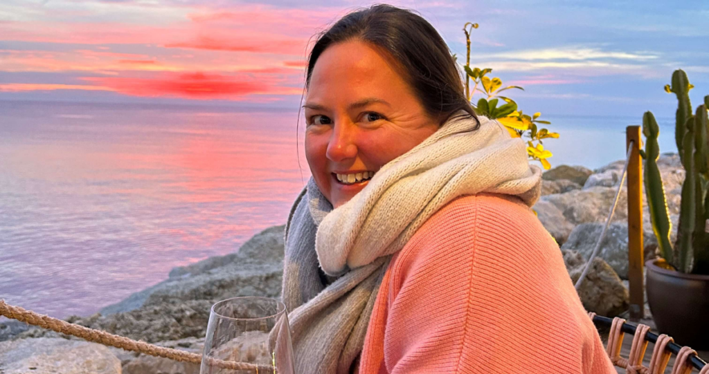 Person looking radiant and refreshed, embodying how best to return from a sabbatical with renewed energy and purpose