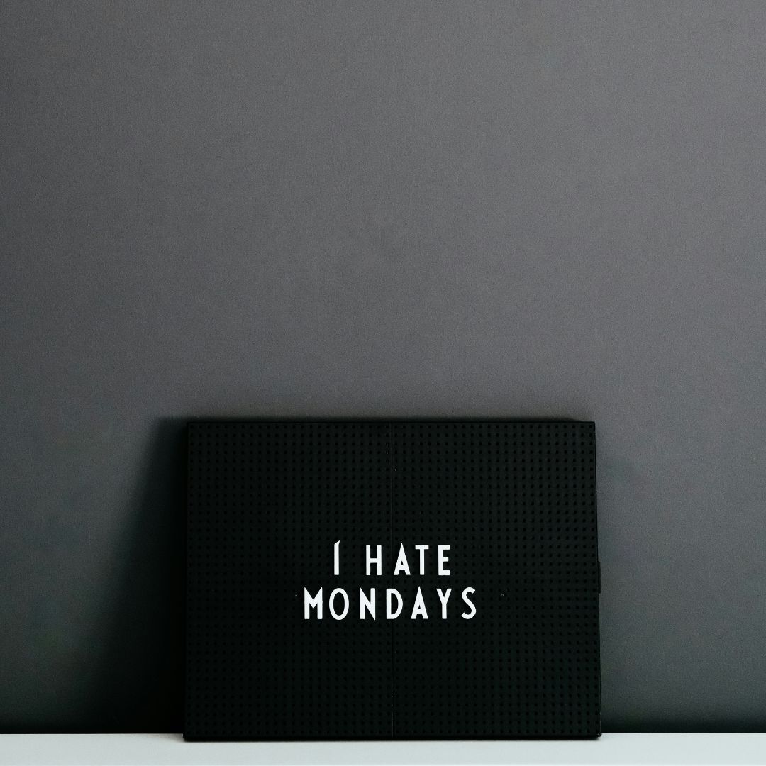 I hate Mondays blackboard symbolising I Hate My Job But I Need Money